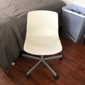 A white rolling chair